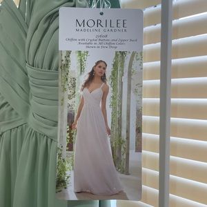 Never worn Mori Lee size 10 dress. Color: SAGE originally $175